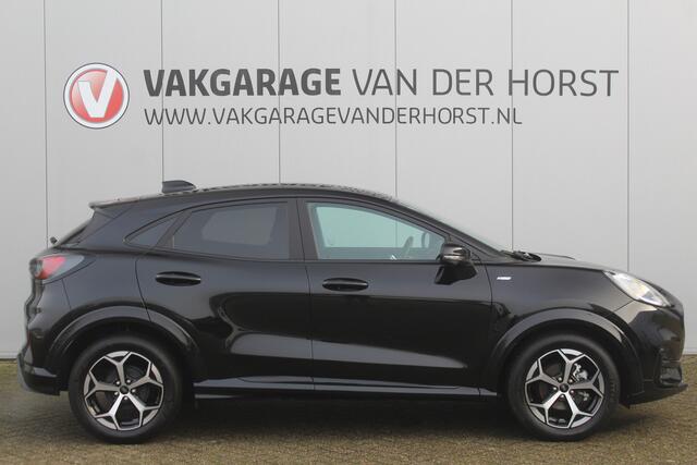 Ford PUMA 1.0-125pk EcoBoost Mild-Hybrid ST-Line. Mooie luxe hoogzitter ! Slechts 12.200km ! Autm. airco, adapt. cruise control, stoel-, stuur- en voorraamverw., navigatie, telefoonvoorb., LM wielen, elektr. achterklep, LED verl., camera, pdc v+a etc.