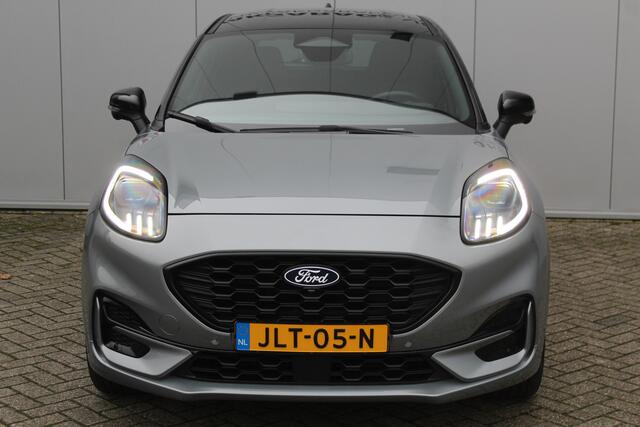 Ford PUMA 1.0-125pk EcoBoost Mild-Hybrid ST-Line, two-tone. Alwéér een prachtige hoogzitter met slechts 12.000km ! Autm. airco, camera 360gr., LM wln, side- en lane assist, adaptieve cruise cntrl, navigatie, telefoonvoorb., stoel-, stuur-- en voorraamverw. etc.