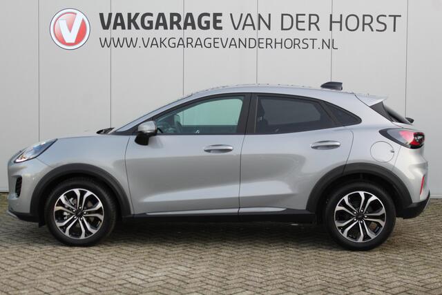 Ford PUMA 1.0-125pk EcoBoost Mild-Hybrid Titanium. Fabrieksgarantie t/m 23-03-2029 ! Werkelijk in nieuwstaat maar wel ruim ¤. 6.000,- beneden de nieuwprijs ! Autm. airco, stoel-, stuur- en voorraamverw., adapt. cruise cntrl, side- en lane assist, navigatie, telefoo