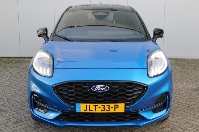 Ford PUMA 1.0-125pk EcoBoost Mild-Hybrid ST-Line. Mooie luxe hoogzitter ! Slechts 9.500km ! Autm. airco, adapt. cruise control, stoel-, stuur- en voorraamverw., navigatie, telefoonvoorb., LM wielen, elektr. achterklep, LED verl., camera 360gr, pdc v+a etc.
