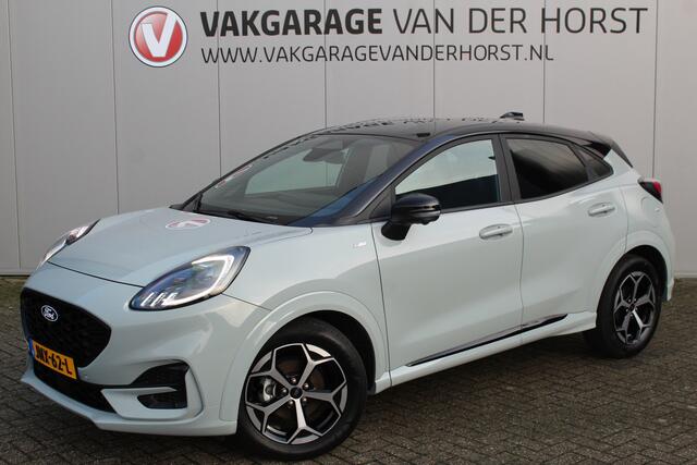 Ford PUMA 1.0-125pk EcoBoost Mild-Hybrid ST-Line. Mooie luxe hoogzitter ! Slechts 9.900km ! Autm. airco, adapt. cruise control, stoel-, stuur- en voorraamverw., navigatie, telefoonvoorb., LM wielen, elektr. achterklep, LED verl., camera 360gr, pdc v+a etc.