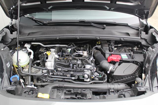 Ford PUMA 1.0-125pk EcoBoost Mild-Hybrid Titanium. Fabrieksgarantie t/m 21-05-2027 ! Slechts 14.800km ! Volautm. airco, pdc achter, all season banden, stoel-, stuur- en voorraamverw., navigatie, telefoonvoorb., elektr. achterklep, cruise cntrl, keyless entry&go etc