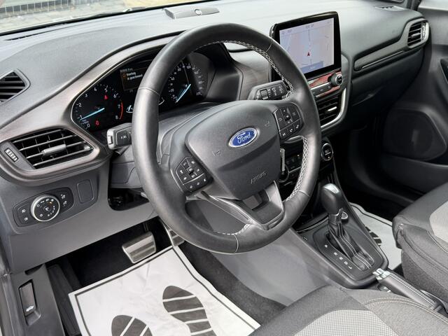 Ford PUMA 125 Pk Titanium X Benzine * Navigatie * Adaptive Cruise Control * Achteruitrij Camera * 18" L.M. Velgen * Vingerhoets; Vierde Generatie Eersteklas Service. Al meer dan 100 jaar een begrip in de Brabantse Kempen.