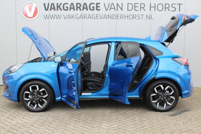 Ford PUMA 1.0-125pk EcoBoost Hybrid ST-Line X. Zeer nette wagen ! Slechts 35.000km ! Autm. airco, cruise cntrl, premium soundsyst., LED verl., navigatie, telefoonvoorb., trekhaak afneemb., stoel, stuur en voorraamverwarming. etc.