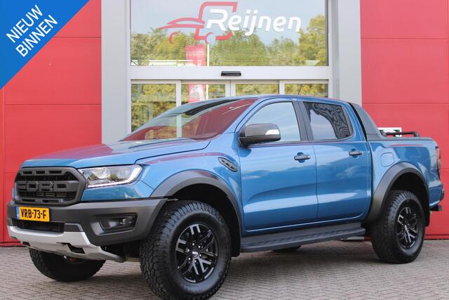 Ford RANGER 2.0 EcoBlue 214PK AUTOMAAT RAPTOR | 2500KG TREKGEWICHT | TREKHAAK | 17" "DYNO GREY" LICHTMETALEN VELGEN | 8-WEG ELEKTRISCH VERSTELBARE VOORSTOELEN | ALL TERRAIN BANDEN | FORD PERFORMANCE OPHANGING | ZWARTE SPIEGELKAPPEN | ZWARTE SIDE STEPS MET RAPTOR LOGO