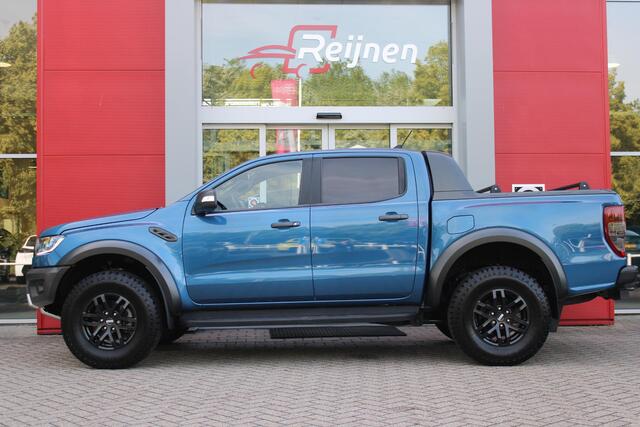 Ford RANGER 2.0 EcoBlue 214PK AUTOMAAT RAPTOR | 2500KG TREKGEWICHT | TREKHAAK | 17" "DYNO GREY" LICHTMETALEN VELGEN | 8-WEG ELEKTRISCH VERSTELBARE VOORSTOELEN | ALL TERRAIN BANDEN | FORD PERFORMANCE OPHANGING | ZWARTE SPIEGELKAPPEN | ZWARTE SIDE STEPS MET RAPTOR LOGO