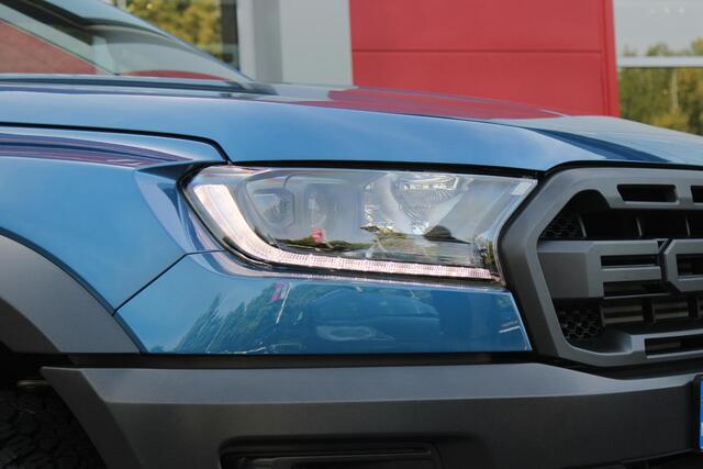 Ford RANGER 2.0 EcoBlue 214PK AUTOMAAT RAPTOR | 2500KG TREKGEWICHT | TREKHAAK | 17" "DYNO GREY" LICHTMETALEN VELGEN | 8-WEG ELEKTRISCH VERSTELBARE VOORSTOELEN | ALL TERRAIN BANDEN | FORD PERFORMANCE OPHANGING | ZWARTE SPIEGELKAPPEN | ZWARTE SIDE STEPS MET RAPTOR LOGO