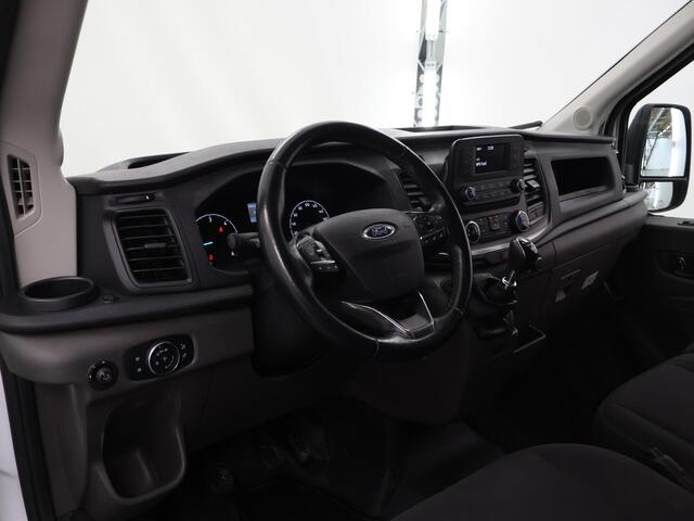 Ford TRANSIT 310 2.0 TDCI | 130 PK | L2 H2 | TREND | IMPERIAAL + LADDER | ACHTERUITRIJCAMERA | DAB+ | CRUISE CONTROL | AIRCO| VOLLEDIGE LAADRUIMTE BETIMMERING | BIJRIJDERSBANK