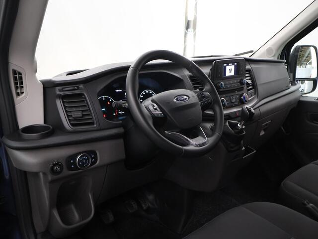Ford TRANSIT 330 | 2.0 TDCI | L2 H2 | TREND | 170 PK | STOELVERWARMING | RAPTOR GRILLE | TRAIL VELGEN | PARKEERSENSOREN | TREKHAAK | DAB + | AIRCO | CRUISE CONTROL | METALLIC | NL | DEALER ONDERHOUDEN
