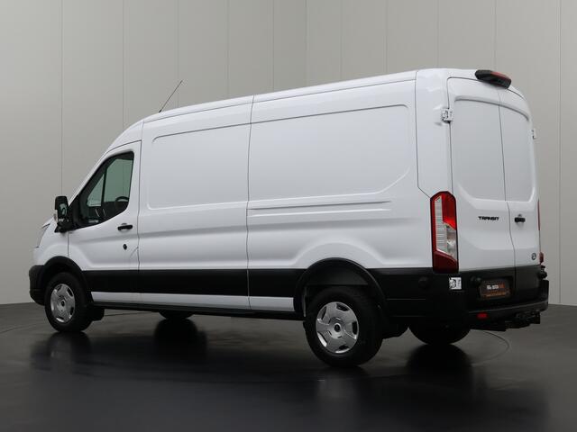 Ford TRANSIT 130PK L3H2 | Navigatie | Camera | Airco | Cruise | Trekhaak | Betimmering | 3-Zits