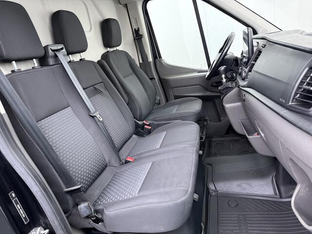 Ford TRANSIT 310 2.0TDCI 130PK L2H2 3-Persoons Navi* Camera Apple Carplay Android Auto Cruise Control Lane Assist Pdc Trend Stoelverwarming Elek.Stoel Wifi DAB Betonplex Vloer Wandbetimmering Schuifdeur 1e Eigenaar Euro 6
