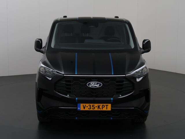 Ford TRANSIT CUSTOM 300 2.0 TDCI Aut. | L2 H1 | Sport | Parkeercamera | Climate Control | Adaptive Cruise | Keyless Go | 3-zits | LM Velgen | Achterdeuren + Spoiler | Carplay - Android | BPM-vrij