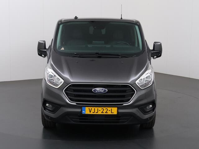 Ford TRANSIT CUSTOM 300 2.0 TDCI Aut. | L2 H1 | Limited | DC | Schuifdeur L+R | LM Velgen | Trekhaak | Lederen bekleding | Navigatie | Stoelverwarming