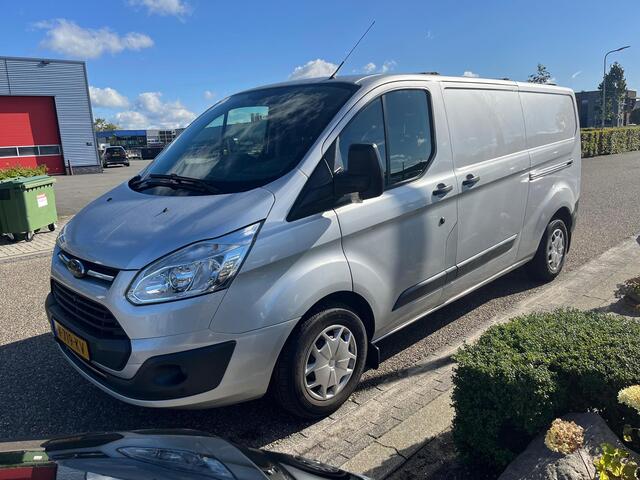 Ford TRANSIT CUSTOM 290 2.0 TDCI L2H1 Trend | Dubbele schuifdeuren | Neerklapbaar imperiaal | BWI | Betimmering | Trekhaak | PDC | Cruise Control