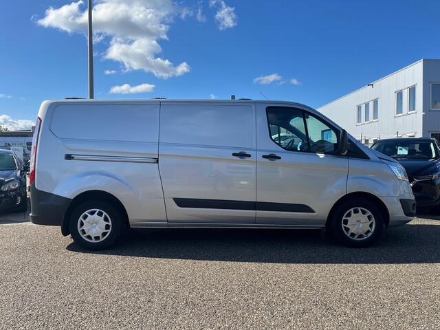 Ford TRANSIT CUSTOM 290 2.0 TDCI L2H1 Trend | Dubbele schuifdeuren | Neerklapbaar imperiaal | BWI | Betimmering | Trekhaak | PDC | Cruise Control