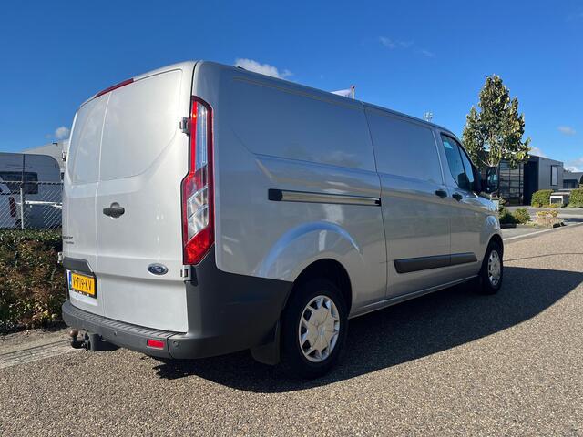 Ford TRANSIT CUSTOM 290 2.0 TDCI L2H1 Trend | Dubbele schuifdeuren | Neerklapbaar imperiaal | BWI | Betimmering | Trekhaak | PDC | Cruise Control