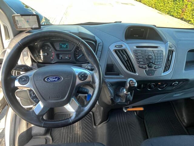 Ford TRANSIT CUSTOM 290 2.0 TDCI L2H1 Trend | Dubbele schuifdeuren | Neerklapbaar imperiaal | BWI | Betimmering | Trekhaak | PDC | Cruise Control