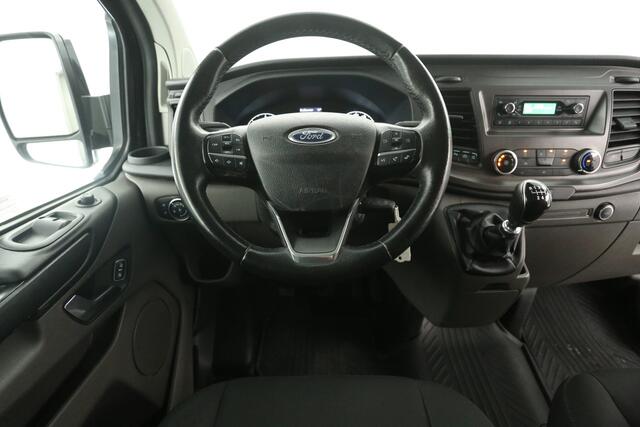 Ford TRANSIT CUSTOM 300 2.0 TDCI L2H1 Airco Cruise Trekhaak LED 3 Persoons 16"LMV PDC Stoelverwarming