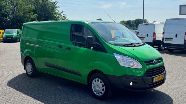 Ford TRANSIT CUSTOM 2.0 TDCI 96KW 131PK L2H1 EURO 6 NAVIGATIE/ AIRCO/ CRUISE CONTROL/ TREKHAAK/ 100% DEALERONDERHOUDEN