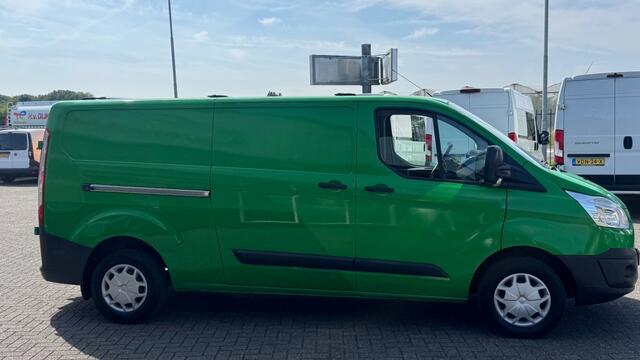 Ford TRANSIT CUSTOM 2.0 TDCI 96KW 131PK L2H1 EURO 6 NAVIGATIE/ AIRCO/ CRUISE CONTROL/ TREKHAAK/ 100% DEALERONDERHOUDEN