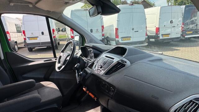 Ford TRANSIT CUSTOM 2.0 TDCI 96KW 131PK L2H1 EURO 6 NAVIGATIE/ AIRCO/ CRUISE CONTROL/ TREKHAAK/ 100% DEALERONDERHOUDEN