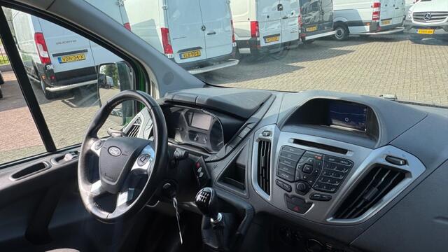 Ford TRANSIT CUSTOM 2.0 TDCI 96KW 131PK L2H1 EURO 6 NAVIGATIE/ AIRCO/ CRUISE CONTROL/ TREKHAAK/ 100% DEALERONDERHOUDEN
