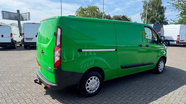 Ford TRANSIT CUSTOM 2.0 TDCI 96KW 131PK L2H1 EURO 6 NAVIGATIE/ AIRCO/ CRUISE CONTROL/ TREKHAAK/ 100% DEALERONDERHOUDEN