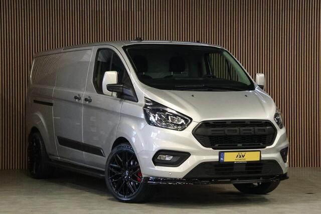 Ford TRANSIT CUSTOM 320 2.0 TDCI L2H1 Raptor Edition | Bi-Xenon | CarPlay | Navigatie | Camera | Stoelverwarming | Dodehoek detector | Lane Assist | DAB | Werkplaatsinrichting | 3-Zitter | Dealer onderhouden | Nieuwe APK
