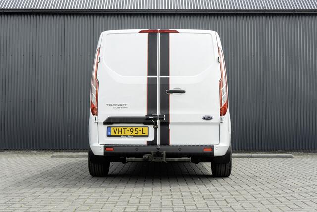Ford TRANSIT CUSTOM 300 TDCI | L2H1 | LED | Omvormer | Cruise | Airco | PDC | Euro 6