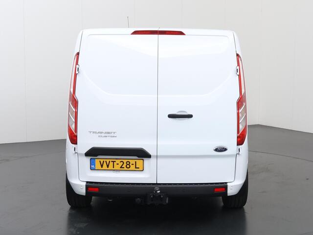 Ford TRANSIT CUSTOM 300 2.0 TDCI | 130 PK | L2 H1 | TREND | STOELVERWARMING | PARKEERSENSOREN | TREKHAAK | CARPLAY | ANDROID AUTO | AIRCO | CRUISE | 18" LICHTMETALEN WIELEN | 3-ZITS | VOORRUITVERWARMING