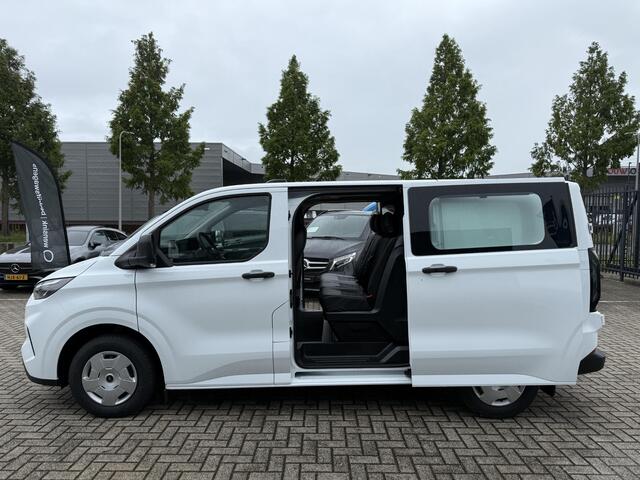 Ford TRANSIT CUSTOM 300 2.0 TDCI | L1 H1 | TREND | DUBBEL CABINE | TREKHAAK | 6-ZITS | CARPLAY | ANDROID AUTO | PARKEERCAMERA | CLIMA | LEDEREN STOELHOEZEN | BETIMMERDE LAADRUIMTE | VOORRUITVERWARMING | 2X ZIJSCHUIFDEUR | CRUISE CONTROL