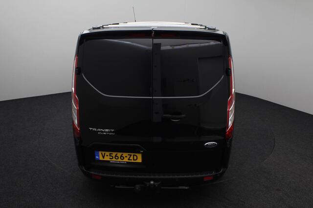 Ford TRANSIT CUSTOM 300 2.0 TDCI L2H1 Limited DC 2019 | Dubbel cabine | 2x schuifdeur | Trekhaak | Airco | Cruise Control | Navigatie | Achteruitrij Camera | DAB Radio | Dakdragers | Parkeersensoren | Boekjes | 2 Sleutels | Nationale Autopas
