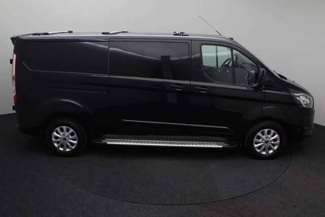 Ford TRANSIT CUSTOM 300 2.0 TDCI L2H1 Limited DC 2019 | Dubbel cabine | 2x schuifdeur | Trekhaak | Airco | Cruise Control | Navigatie | Achteruitrij Camera | DAB Radio | Dakdragers | Parkeersensoren | Boekjes | 2 Sleutels | Nationale Autopas