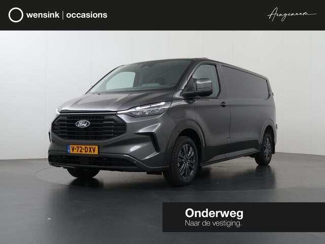 Ford TRANSIT CUSTOM 320 2.0 TDCI | L2 H1 | LIMITED | STOEL - STOEL | ADAPTIVE CRUISE | STOELVERWARMING/STUURWIELVERWARMING | BLIND SPOT | CAMERA | NAVIGATIE | CLIMATE CONTROL | LAADRUIMTE PAKKET | LED LAMPEN | KEYLESS ENTRY | KEYLESS START