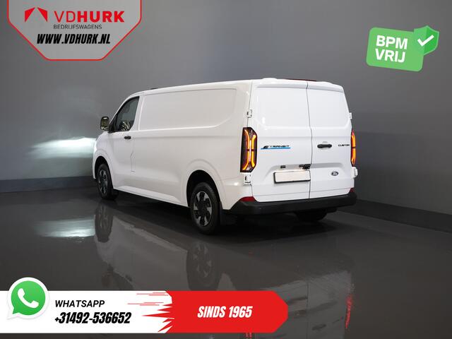 Ford TRANSIT CUSTOM E-Transit 320 L2 65 kWh 330 km WLTP 2.3t Trekverm./ Snellader/ LED/ Standkachel/ Stoelverw./ Stuur.Verw./ Voorruit.Verw./ Carplay/ Camera/ Climate/ PDC/ Cruise