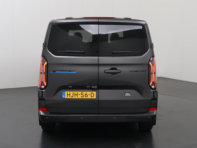 Ford TRANSIT CUSTOM 340 LIMITED | L2 H1 | 65 kWh | ELEKTRISCH | 8-ZITS | ¤53.785,00 INCL. BTW | 2X ZIJSCHUIFDEUR | NAVIGATIE | STOEL/STUURWIELVERWARMING | BLIND SPOT | METALLIC | PARKEERPAKKET | 8 - PEROONS