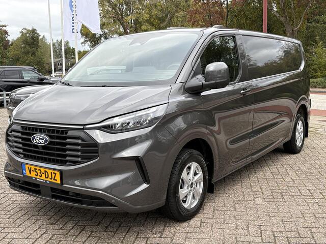 Ford TRANSIT CUSTOM 320 2.0 TDCI L2H1 Limited | SCI |136pk | Trekhaak | Stoel- & Stuurwielverwarming | Navigatie | LM Velgen | Doorschuifluik | Passagiersbank |