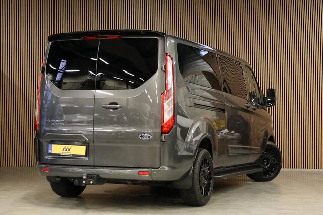 Ford TRANSIT CUSTOM 300 2.0 TDCI L2H1 170 PK Limited DC | B-Xenon | Blind Spot | CarPlay | Camera | Navigatie | Stoelverwarming | Trekhaak | L+R Schuifdeur | PDC V+A | MF Stuur | Dubbel cabine | 5-Zitter | Nieuwe APK | NAP Logisch