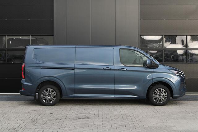 Ford TRANSIT CUSTOM E-Transit 340 L2H1 Limited 65 kWh 218pk - 2x Schuif - LED - 360 Camera - B&O - ACC - Navi - Stoel/Stuurverwarming - Rijklaar