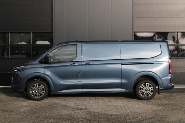 Ford TRANSIT CUSTOM E-Transit 340 L2H1 Limited 65 kWh 218pk - 2x Schuif - LED - 360 Camera - B&O - ACC - Navi - Stoel/Stuurverwarming - Rijklaar