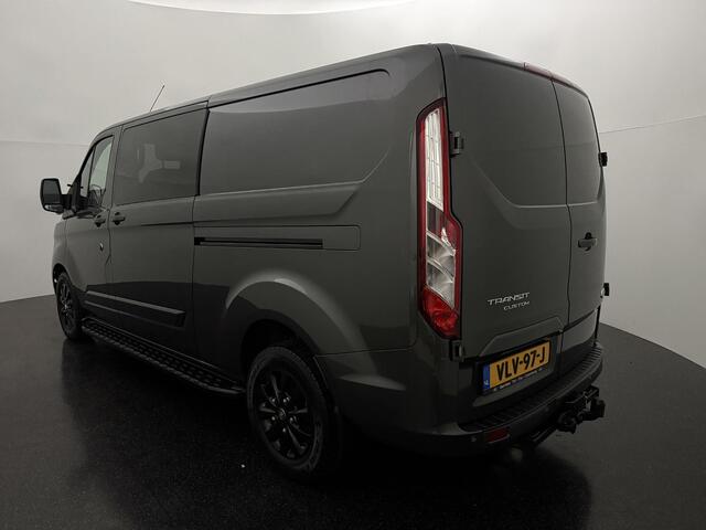 Ford TRANSIT CUSTOM 300 2.0 TDCI L2H1 Limited DC met o.a. Een Achteruitrijcamera, Parkeersensoren, Een Navigatiesysteem, Dodehoek detectie en Een Trekhaak