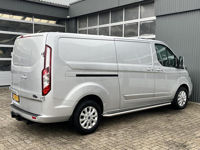Ford TRANSIT CUSTOM 300 2.0 TDCI L2H1 Limited Airco Cruise control Trekhaak 2800kg trekgewicht 3-Persoons Stoelverwarming Telefoonverbinding Achterruitrij camera Parkeersensoren voor en achter Schuifdeur Euro 6