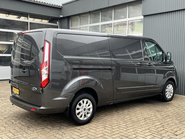 Ford TRANSIT CUSTOM 320 2.0 TDCI L2H1 Limited Airco Cruise control 3-Persoons Stoelverwarming Telefoonverbinding Navigatiesysteem Parkeersensoren voor en achter Schuifdeur Euro 6