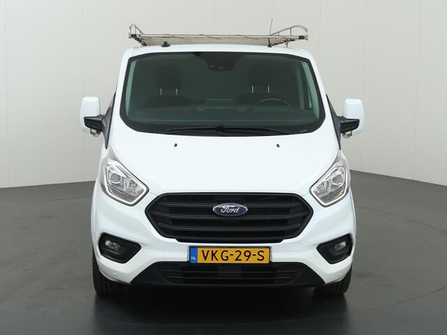 Ford TRANSIT CUSTOM 320 2.0 TDCI | Aut. | L2 H1 | TREND | AIRCO | CRUISE CONTROL | CAMERA | STOELVERWARMING | STOEL - STOEL | APPLE CARPLAY EN ANDROID AUTO | TREKHAAK | PARKEERSENSOREN