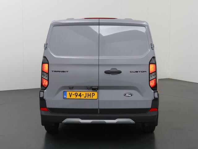 Ford TRANSIT CUSTOM 320 | 2.0 TDCI | L2 H1 | TRAIL | DUBBEL CABINE | LEDEREN BEKLEDING | DUBBELE ZIJSCHUIFDEUREN | PARKEERCAMERA | DODEHOEK DETECTIE | ADAPTIEVE CRUISE | APPLE CARPLAY / ANDROID AUTO | STOELVERWARMING | STUURWIELVERWARMING
