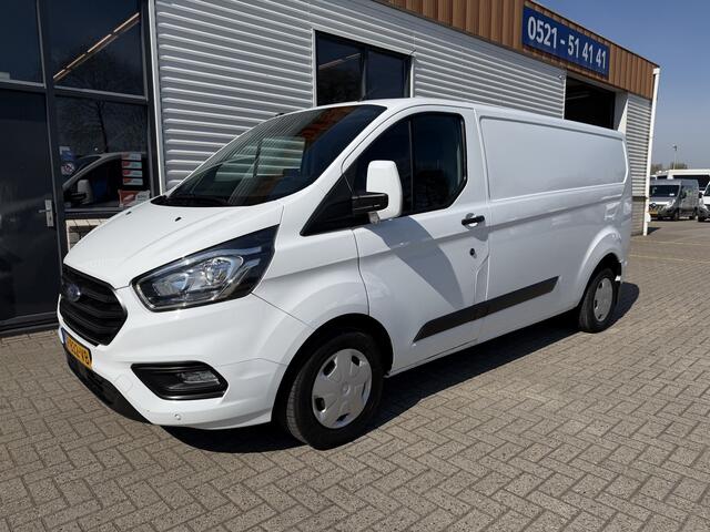 Ford TRANSIT CUSTOM 300 2.0 TDCI 130pk L2H1 Trend / euro 6 / vaste prijs rijklaar ¤ 12.950 ex btw / lease vanaf ¤ 218 / airco / cruise / navigatie / camera / trekhaak 2700 kg !
