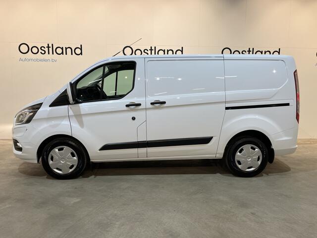 Ford TRANSIT CUSTOM 340 L1H1 PHEV Benzine Hybride Trend Automaat / Euro 6 / Schuifdeur L + R / Airco / CarPlay / Cruise Control / Camera / Navigatie / Klep / 3-Zits / 18.300 KM !!