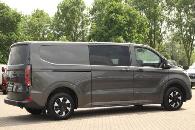 Ford TRANSIT CUSTOM E-Transit 320 L2H1 Trend 71kWh 218pk DC Automaat | Trekgewicht 2300kg | L+R Zijdeur | Keyless | Carplay/Android | Stoel+Stuurvwer. | Lease 771,- p/m