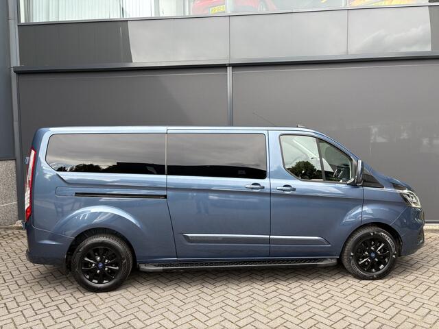 Ford TRANSIT CUSTOM 320 2.0 TDCI L2H1 Platinum Edition DC Automaat Achteruitrijcamera - Parkeersensoren - Navigatie - Airco - Dodehoek detector - Cruise control - Licht metalen velgen 16 inch - Lederen bekleding - Radio - Bluetooth - Dubbele cabine - Tussens - Mistlampen voo