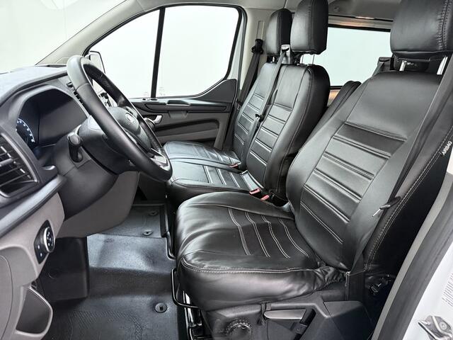 Ford TRANSIT CUSTOM 300 2.0TDCI L2H1 Dubbele Cabine 6-Persoons Trekhaak Navi Camera Cruise Control Imperiaal Airco Stoelverwarming Pdc DC DAB Bluetooth Betonplex Vloer Wandbetimmering 2.750KG Trekgewicht Origineel Nederlandse Auto